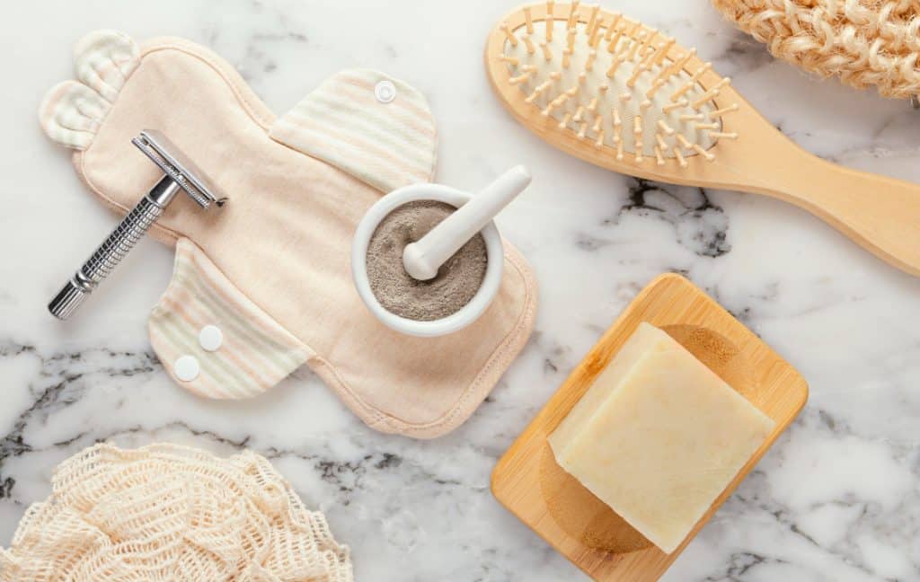 Gentle grooming tools on a soft towel, ready for a pet spa day
