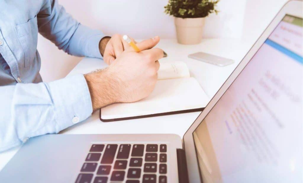 a traveller comparing cheap travel insurance quotes online before making a decision